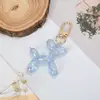 Explosiones transfronterizas llavero de perro bola colorida net red de dibujos animados creativo colgante de animal pequeño llavero colgante de llave al por mayor