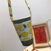 Funda para taza de té de leche portátil de dibujos animados de perro linda estilo Ins, bolsa de lona, funda aislante para taza de café anti-quemaduras al por mayor