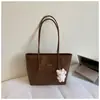 Bolso Tote de Color Sólido Simple 2026 Verano Nueva Moda Gran Capacidad Trabajo Viaje Casual Bolso de Hombro Debajo del Brazo
