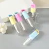 Nuevo tubo de brillo de labios con tapa colgante, herramienta dispensadora, material de empaque cosmético, tubo de brillo de labios vacío