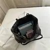 Bolso tote estampado de leopardo, gran capacidad, bolso de mano versátil para mujer, adecuado para ir al trabajo, bolso de hombro, bolsa de compras, estilo nuevo, venta al por mayor para exportación