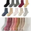 Calcetines de color sólido de comercio electrónico transfronterizo, venta al por mayor de invierno, calcetines altos de tubo gruesos y cálidos para mujer, calcetines de comercio exterior