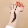 Colgante de Diente de Lobo de Obsidiana Natural al por Mayor para Hombres y Mujeres, Colgante de Collar Popular en Línea Protector del Año de Nacimiento de Parejas