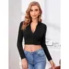 Camiseta corta negra elegante de estilo europeo y americano para primavera-verano, ajustada, con escote en V profundo, sexy, con cremallera