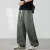 Calça casual reta de algodão puro com caimento para o outono para homens, marca moderna estilo americano, cor sólida, calça longa de perna larga solta e versátil para homens