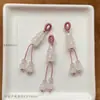 Precio mayorista directo de fábrica pulsera hecha a mano pulsera con colgante diy accesorios pequeños deslizantes colgante de garra de gato lindo Joker