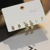 Pendientes pequeños de una semana, populares pendientes pequeños de aguja de plata S925, una tarjeta, tres pares de pendientes de combinación de traje, pendientes de circonita roja de red para mujer
