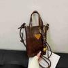 Bolso de mano simple para mujer 2024 invierno nuevo versátil ins bolso de hombro bandolera tendencia de este año bolso para teléfono móvil
