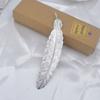 Estilo étnico retro metal pluma marcapáginas transfronterizo diy accesorios de joyería regalo para estudiante pluma retro marcapáginas