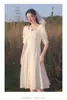 Vestido Branco de Dama de Honra de Comprimento Médio para Registro de Casamento, Novo Estilo de Verão 2026, Adequado para Melhores Amigas, Corais e Grupos de Irmãs, Pode Ser Usado Casualmente como um Vestido Formal