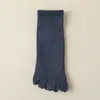 Calcetines de yoga antideslizantes de silicona de cinco dedos para mujer calcetines para mujer calcetines de tubo medio para fitness deportivo profesional color liso dedos divididos calcetines de Pilates