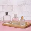 Botella de Vidrio Transparente para Perfumería Botella con Atomizador de Presión Botella Pequeña para Subenvasado Botella Pequeña de Muestra Portátil Botella con Atomizador de Tónico Cosmético Botella Vacía