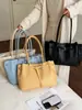 Bolsa de mano informal transfronteriza de gran capacidad, modelo nuevo 2026 para mujer, bolso de mano moderno para el trabajo y el día a día