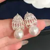 Aretes huecos de encaje retro estilo francés con circonitas cúbicas y piedras de ojo de tigre, en una paleta de colores Melard, que ofrecen un look lujoso y sofisticado, y un accesorio de moda