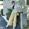 Traje de Verão para Gestante 2025 - Blusa de Manga Curta com Ombro a Mostra em Tecido French com Bolinhas Onduladas + Calça Reta Casual para Gestantes