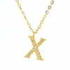 Comercio exterior transfronterizo popular collar de 26 letras colgante de acero de titanio moda europea y americana cadena de clavícula simple venta al por mayor de joyería de fábrica
