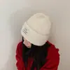 Al por mayor 25 Años Otoño e Invierno Nuevo de Alta Calidad Color Sólido Parche Circunferencia de Cabeza Grande Gorro de Punto Casual Cálido y a Prueba de Frío Gorro de Lana