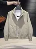 Chaqueta de trabajo informal versátil de color liso con cuello mao, estilo americano, moderna, para hombres jóvenes, moda primavera y otoño 2026