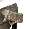 Bolso de Mujer de Nicho Estilo Francés 2025 Nuevo Bolso Plegado Versátil Bolso Cruzado con Cadena Bolso de Hombro de Moda
