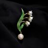 Broche simples de orquídea lírio temperamento feminino de alta qualidade esmalte de pérola corsage alfinete de design nicho acessórios para terno