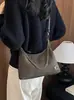 Bolso de axila de gamuza mate vintage para mujer, Nuevo bolso de hombro cruzado texturizado de nicho de alta gama Otoño/Invierno 2026