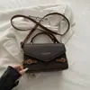 Bolsa de mão quadrada pequena de alta qualidade estilo coreano, nova bolsa de ombro da moda, elegante e minimalista, bolsa transversal versátil para vendas transfronteiriças