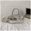 Bolso de Mano Pequeño Plateado Transfronterizo para Mujer 2026 Nuevo Estilo de Nicho Moda Coreana Bolso de Hombro Versátil Bolso Cruzado Simple