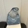 2026 Nova Bolsa de Ombro Transversal Versátil Elegante de Grande Capacidade Simples Casual com Estampa de Laços Doces de Alto Valor