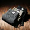 Estación europea pantalones finos de primavera y verano para hombre modal sarga sin planchar cómodos de algodón rectos holgados casuales