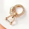 Llavero colgante de estribo de diamante personalidad creativa DIY aleación de zinc herradura hebilla D anillo de resorte accesorios para llaves al por mayor