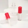 Nuevo tubo de brillo de labios en rosa con un degradado de ola, tubo de brillo de labios negro, herramienta dispensadora, material de empaque cosmético, tubo de brillo de labios vacío