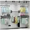Perchero de hierro forjado para tienda de ropa, expositor de pie, colgador lateral de pared, estante para ropa de hombre, mujer y niño, perchero de pared en la pared