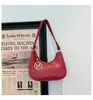 Color sólido, textura elegante y de alta calidad, tendencia de primavera 2025, nuevo bolso de hombro único estilo coreano para debajo del brazo, bolso de mano casual