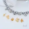 Chapado en cobre oro de 14K superficie lisa flor pequeña capullo rosa trébol de cuatro hojas trébol de tres hojas hojas dobles colgante accesorios hechos a mano para DIY