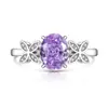 Transmisión en Vivo Más Vendido Anillo Huevo de Paloma Cortado Flor de Hielo de Piedra Preciosa de Color para Mujer Incrustado con Diamante de Alto Carbono Anillo de Mariposa Fabricante Dropshipping