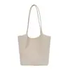 Bolsa de mano tejida estilo retro para mujer, nuevo diseño moderno y de moda 2026, con un toque de alta gama y gran capacidad, similar a una cesta de compras
