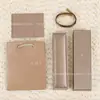 Empaque para collar de trébol de cuatro hojas, pulsera, aretes, anillo, caja de regalo para joyería, bolsa de regalo, caja de joyería Kirin Shangmei