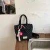 2026 Verano Nuevo de Moda Gran Capacidad Estilo Coreano Lunares Moderno Casual para Viajes Diarios Cruzado de Alto Valor Bolso Cruzado de Hombro Tipo Cubo