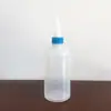 Olla de aceite de plástico para coche plano grande de plástico industrial para el hogar boca puntiaguda olla de aceite 60ml/150m cadena torno trabajador ropa de fábrica