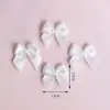 Al por mayor Lazos de Cinta de 3 Puntos Moños de Cinta DIY Flores Pequeñas Accesorios para Ropa Interior Ropa Piezas Decorativas Hecho a Mano