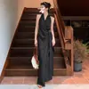 Vestido sin mangas de estilo francés con cuello halter para mujer, nuevo modelo de verano, espectacularmente hermoso, con un diseño que ciñe la cintura y cinturón para atar.