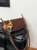 Bolso de Leopardo de Nicho Otoño e Invierno 2025 Nueva Moda Correa Ancha para el Hombro Bolso Cruzado Bolso Cuadrado Pequeño Simple de Alta Gama Maillard