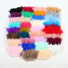Directo de fábrica pieza de rasgar fuego tela de plumas accesorios hechos a mano diy ropa falda plumas decorativas venta al por mayor