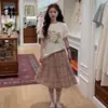 Camiseta de manga corta mujer verano 2026 nuevo estilo hombro normal sentido del diseño nicho único hermoso top verano algodón puro ropa de verano