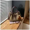 Bolso de diseño único para mujer, nuevo bolso cubo retro estilo coreano de ante, elegante bolso de hombro y bolso cruzado
