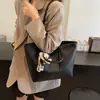 Bolso tote relajado y minimalista para mujer, nueva colección otoño/invierno 2026, lujo ligero, diseño de nicho, sensación de alta gama, bolso de hombro de gran capacidad