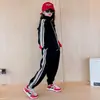 Conjunto de Primavera y Otoño para Niñas 2026 Nuevo Estilo Niños Medianos y Grandes Moda Chaqueta de Cuello Alto Pantalones Deportivos Casuales Conjunto de Dos Piezas