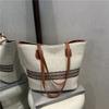 Bolsas de Alto Valor Estético 2025 Primavera/Verano Nueva Moda Tendencia Bolso Tote Simple de Gran Capacidad Bolso de Hombro Versátil y Elegante de Primavera