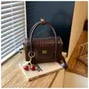Bolso de hombro grande de estilo coreano para mujer, simple, versátil, moderno, casual, bolso de mano para el trabajo de cuero suave