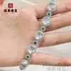Novo Pulseira de Rosto em Forma de Ovo de Jadeíta Semelhante ao Vidro Inlaid de Luxo Leve Chinês para Mulheres Joia de Mão Cabaça Nobre Exquisita de Alta Qualidade